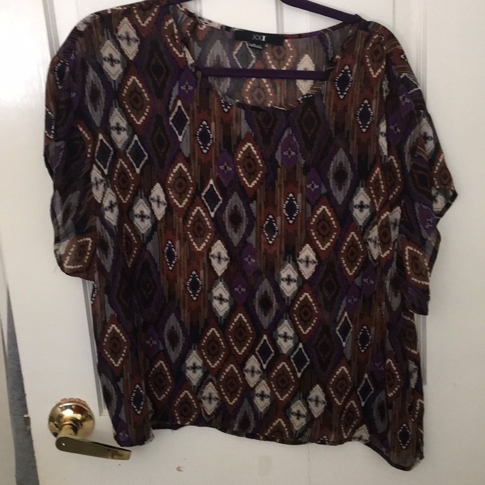 Tribal patterned blouse.